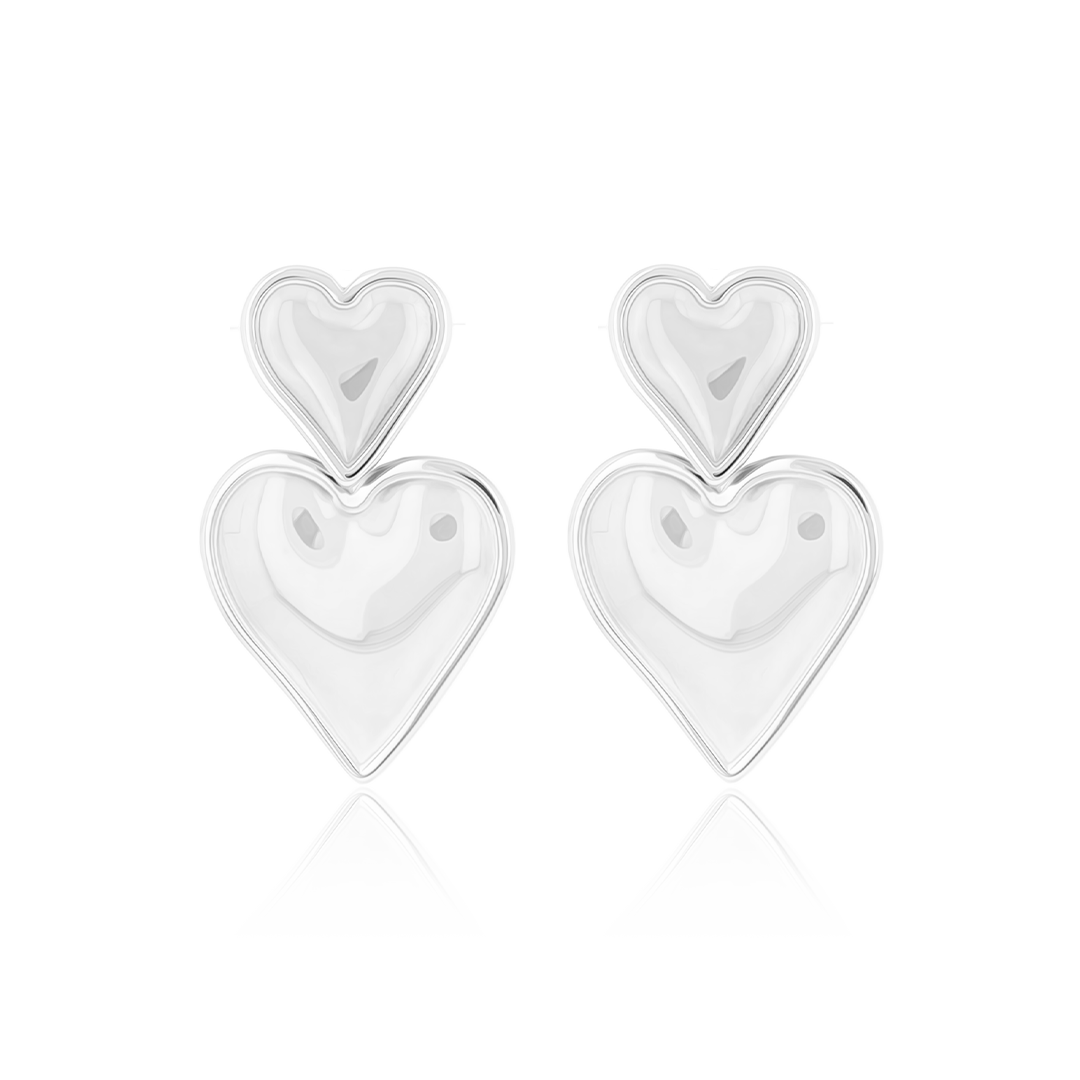 Silver coloured earrings with hearts